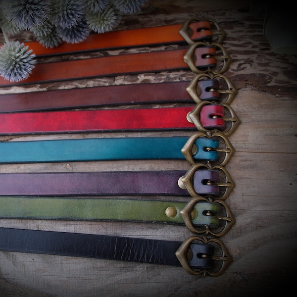 Thin, custom-made leather belt in a solid color