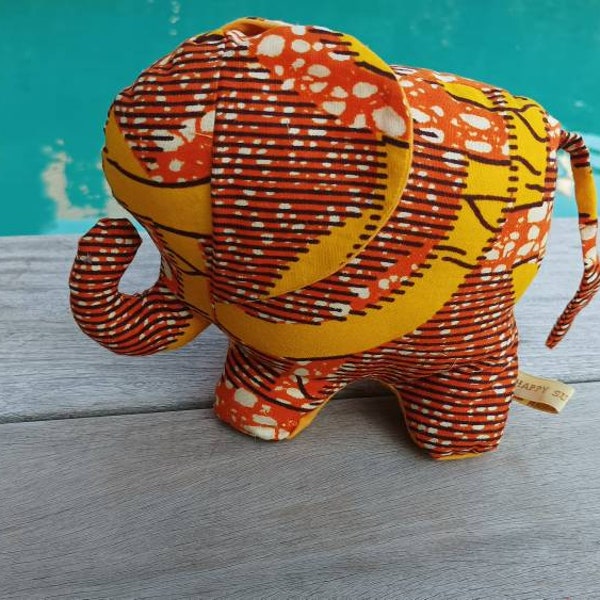 Doudou éléphant en wax pagne africain coloré orange et jaune pour enfant ou pour décorer