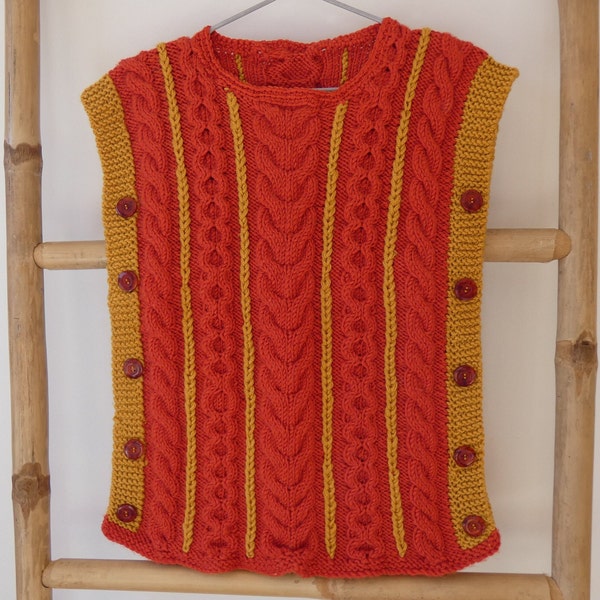 Poncho enfant orange et ocre point fantaisie.