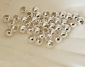 Smooth 2mm beads with a 0.9mm hole, made of 925 sterling silver; 2mm 925 silver balls