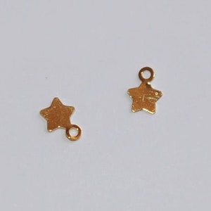 Set of 2 gold plated stars MM 6 mm