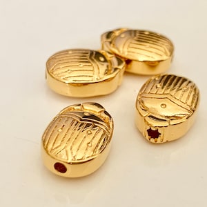 Scarab 14x10mm gold, 24 carat gold plated domed scarab connector