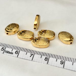 Scarab 13x9.5mm gold-plated, domed scarab connector, 24-carat gold plated