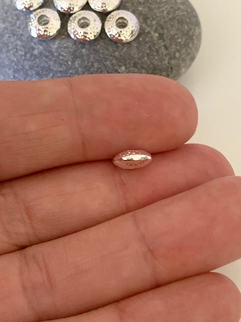 1 x 7 mm försilvrad distanspärla, ädelstenspärlor, läderarmband, vaxade trådar bild 4