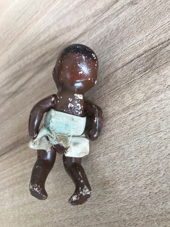 Antique black bisque doll deals