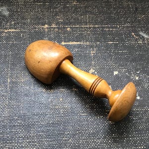 May include: A rustic wooden sign with the text "Welcome to our home" in white lettering. The sign features a distressed finish and a simple, inviting design, perfect for entryway decor.