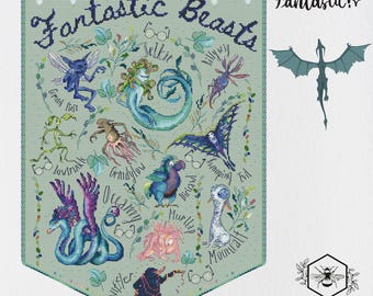 May include: A cross-stitch pattern featuring a variety of fantastical creatures, including a selkie, a grindylow, a loveland, a mooncalf, a wump, a niffler, and a murmup. The pattern is surrounded by a green border with the text "Fantastic Beasts" in a whimsical font.
