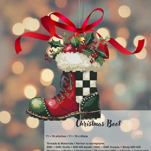 May include: A cross-stitch Christmas boot ornament with a red, green, and black checkered design. The boot is decorated with holly and berries, topped with a white cuff, and a red ribbon. The text "Christmas Boot" is visible.