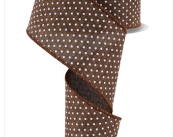 May include: Brown and white polka dot ribbon. The ribbon is made of a textured fabric and has a white polka dot pattern on a brown background.