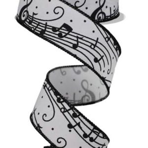May include: White ribbon with black musical notes and a black border. The ribbon is curled and has a white background with black musical notes and a black border.