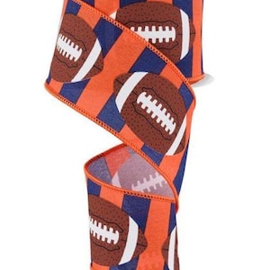 May include: Orange and navy blue ribbon with a repeated pattern of brown and white footballs.