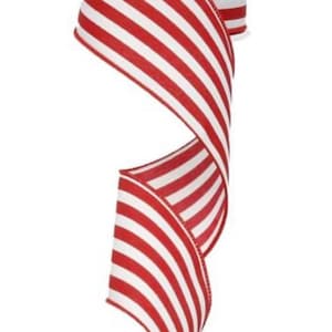 May include: A roll of red and white striped ribbon. The ribbon is a bright red color with wide white stripes. The ribbon is curled and twisted, showing the pattern. The spool is white. This ribbon is suitable for gift wrapping, crafts, and decorations.