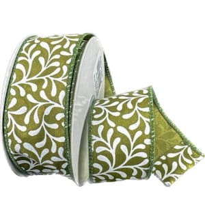 May include: A roll of decorative ribbon featuring a repeating white leaf pattern on an olive green background. The ribbon has a wired edge and is suitable for crafts, gift wrapping, and floral arrangements.