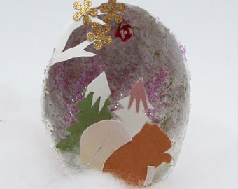 Paper mache Christmas egg and paper cut squirrel