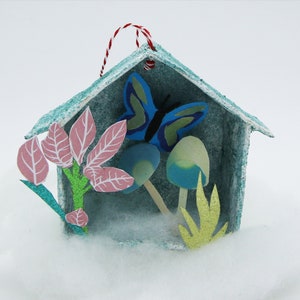 Paper mache Christmas box and paper cut butterfly