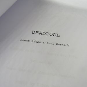 May include: A black and white title page for the screenplay "DEADPOOL" by Rhett Reese & Paul Wernick.