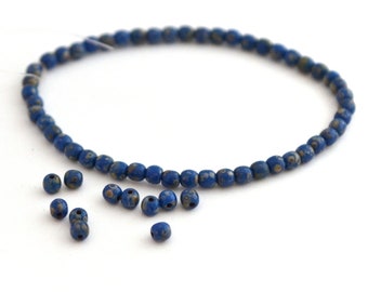 50 perles rondes bleu indigo et bronze 3 mm en verre de Bohème