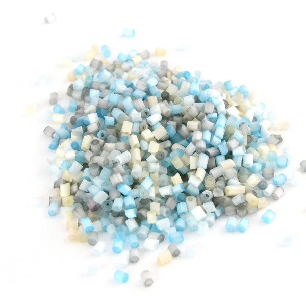 Perles de rocaille tubes turquoise en verre 2x2mm