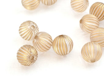 50 transparent and gold round beads 9 mm in acrylic