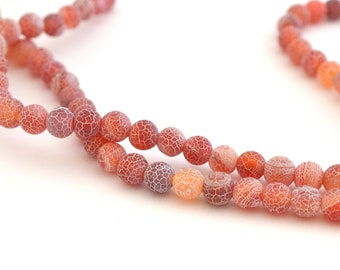 65 perles naturelles en agate teintes en rose craquelé 6mm de diamètre