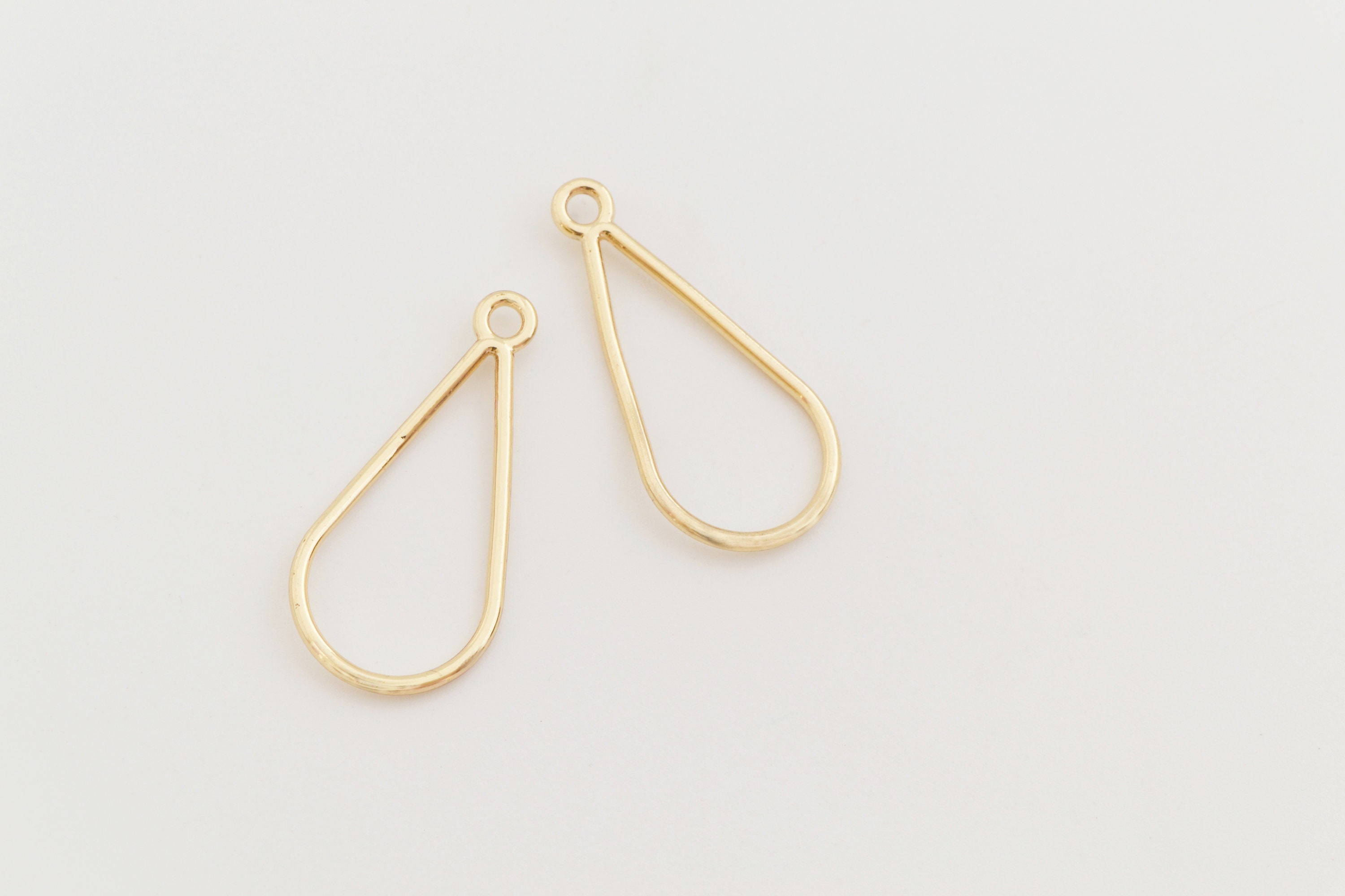 2 gouden druppelhangers 29 mm