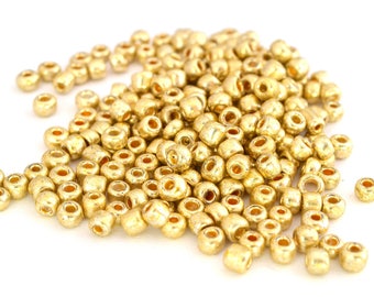50 Gr de Grosses perles de rocaille 6/0 dorées ou bronze en verre 4mm