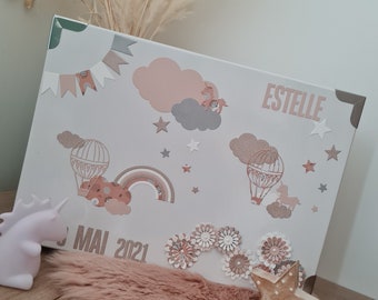 Cloud, hot air balloon and unicorn themed souvenir box, pink tones