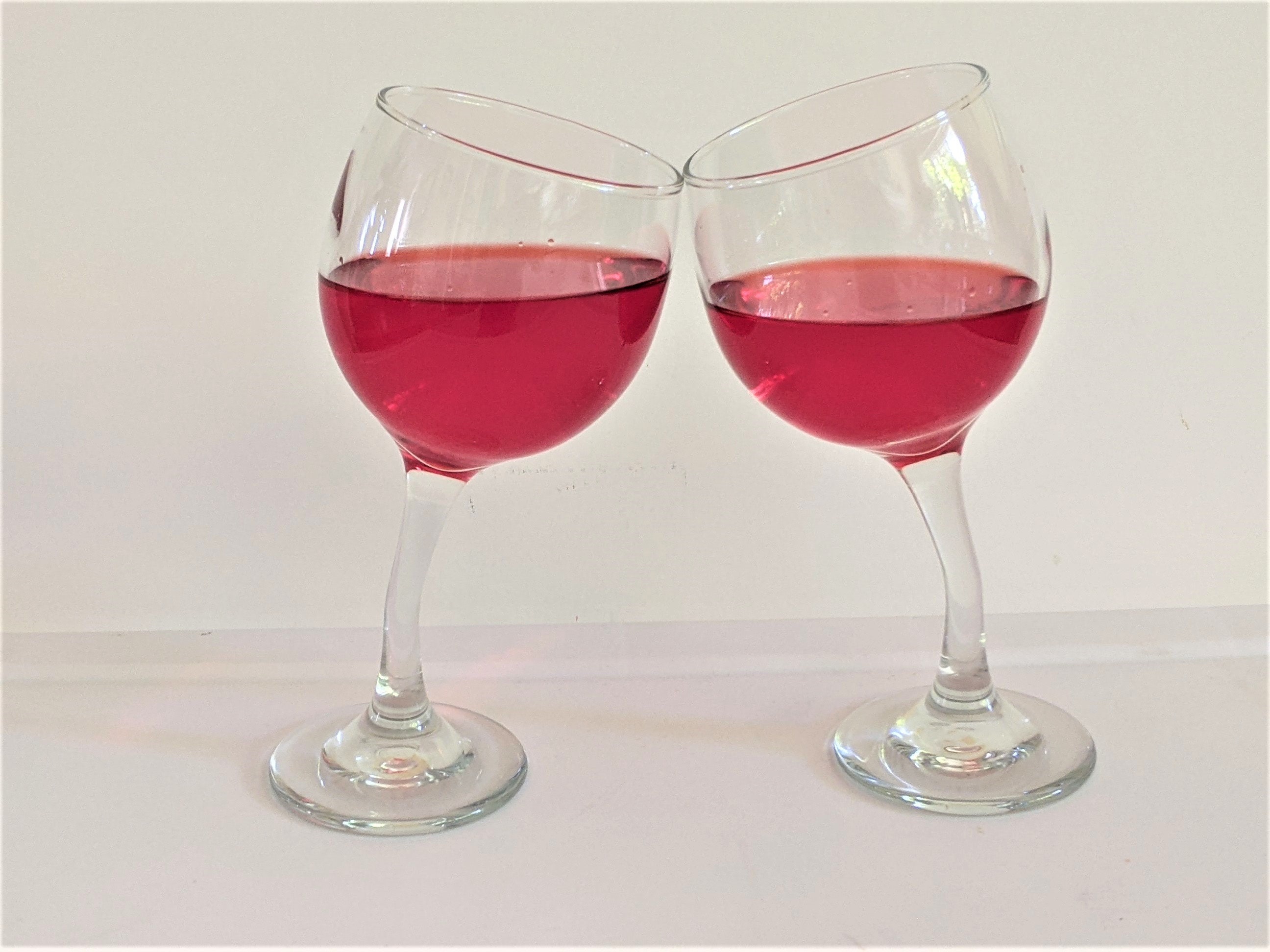 TIPSY WINE GLASS SET of 2 CLEAR BENT STEM FUN GIFT BARWARE