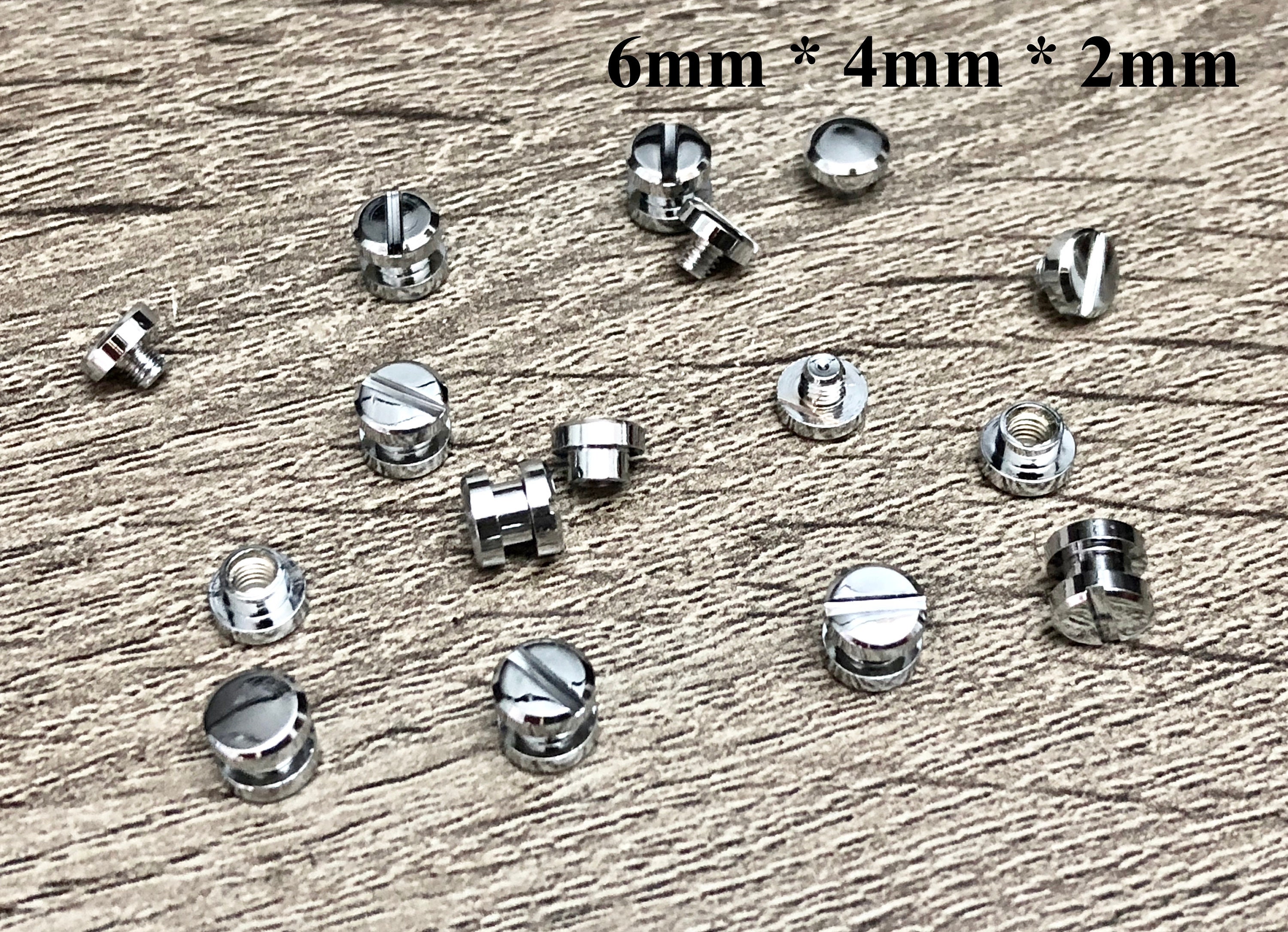 Buy your Chicago screws silver nr. 0 A= screw-head Ø 10 mm, B= screw-tube  length 2 mm, C= Ø 5 mm (per 10 pcs.) online