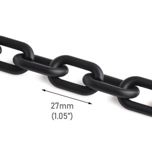 May include: Black chain link with a measurement of 27mm (1.05")