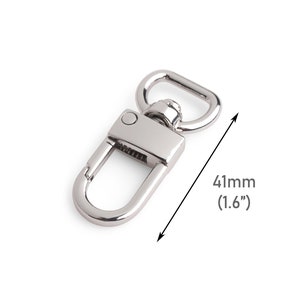 May include: A shiny silver swivel clasp with a rectangular base and a spring-loaded hook. The clasp includes a D-ring and measures 1.6 inches (41mm) in length. Ideal for attaching to bags, keychains, or other accessories.