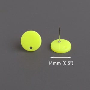 May include: A pair of neon yellow round stud earrings with a silver post. The earrings are 14mm in diameter.