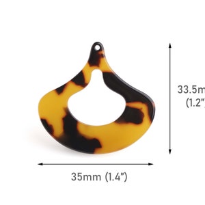 May include: A brown and yellow tortoiseshell plastic earring with a teardrop shape and a hole at the top. The earring is 1.4 inches wide and 1.2 inches tall.