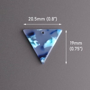 May include: A translucent blue and white triangle-shaped pendant with a hole at the top. The pendant measures 0.8 inches wide and 0.75 inches tall.