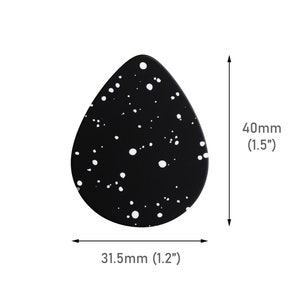 May include: Black guitar pick with white speckles. The pick is shaped like a teardrop and measures 1.5 inches by 1.2 inches.