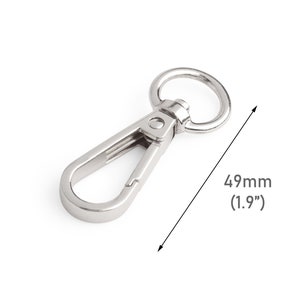 May include: Silver swivel clasp hook with a 1.9 inch length. The hook has a round ring at the top and a swiveling clasp at the bottom.