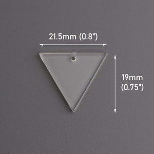 May include: A clear plastic triangle pendant with a hole at the top. The pendant measures 2.1 cm wide and 1.9 cm tall.