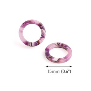 K&ouml;nnte beinhalten: Zwei rosa und violette marmorierte Kunststoffringe, jeder mit einem Durchmesser von 15 mm (0,6 Zoll).