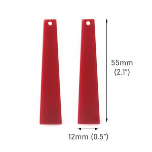 May include: Two red acrylic earring blanks, each measuring 2.1 inches in length and 0.5 inches in width.
