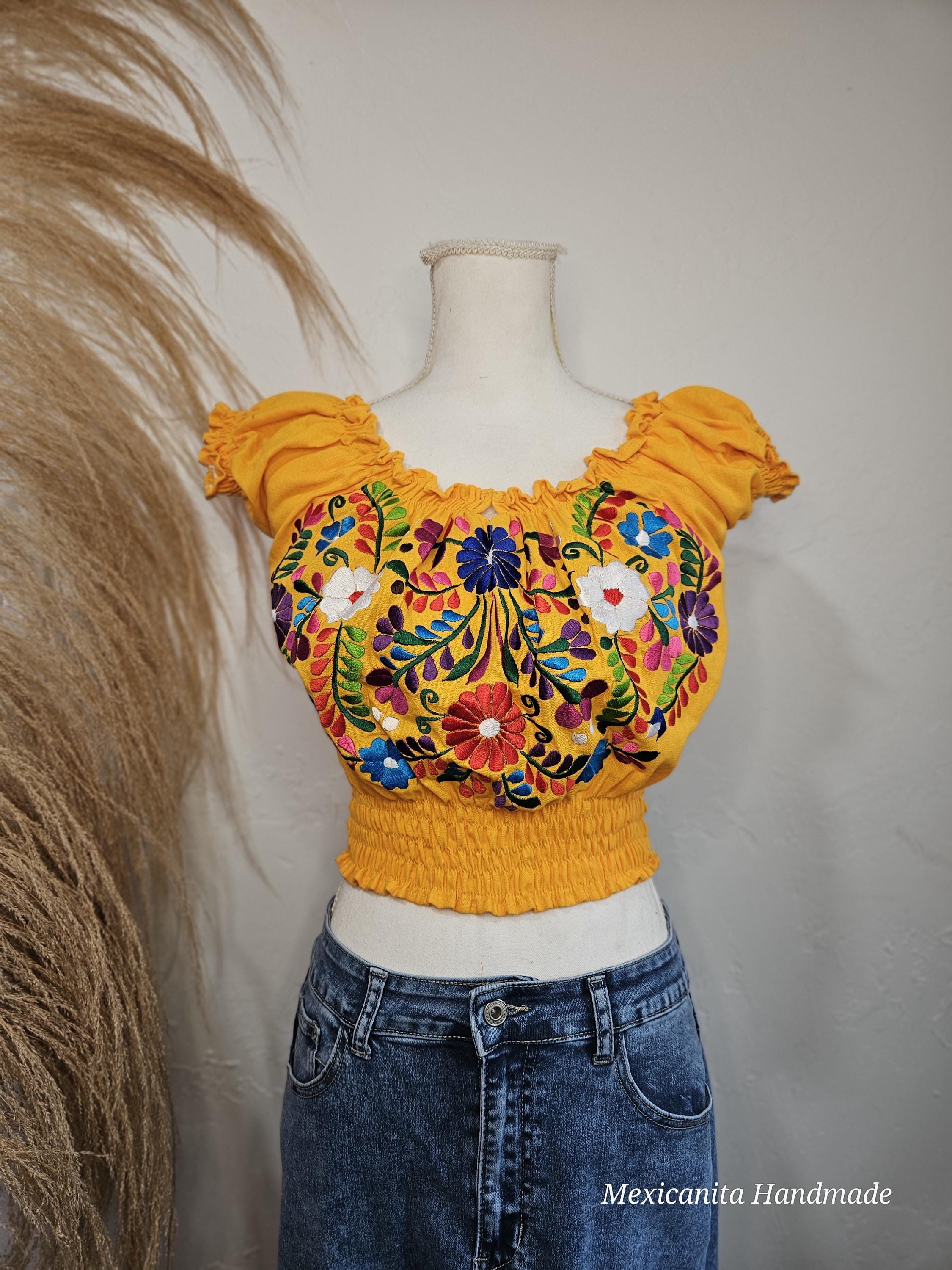 刺繍入り花柄メキシカンオフショルダーブラウス：伸縮性のあるクロップ