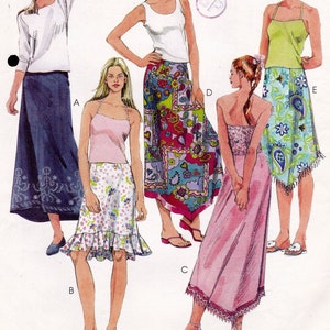 May include: Five different skirt styles with various patterns and colors. The skirts are all knee-length and have different details, such as ruffles, lace, and fringe.