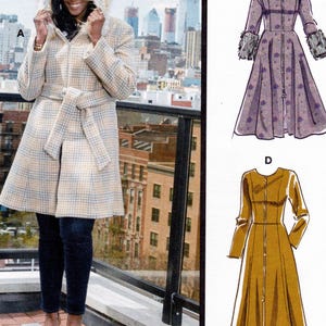 May include: A long, belted coat with a plaid pattern and a faux fur-trimmed hood. The coat is shown in a light brown and beige color scheme. The model is wearing the coat with dark blue jeans and brown heels.