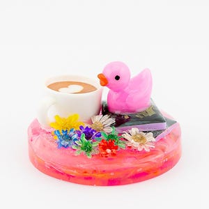 Brewed Between the Pages Resin Duck | Handcrafted Resin Book Stack Duck with Coffee & Flowers | Cozy Bookish Gift | Cruise Duck Hiding