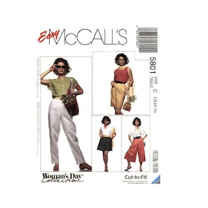 May include: McCall's Easy sewing pattern for women's clothing. The pattern is for sizes 10, 12, and 14. The pattern includes three different styles: a pair of white pants, a pair of red culottes, and a black and white patterned skirt. The pattern is part of the Woman's Day Collection.