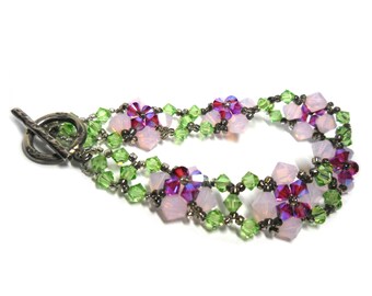 Beaded Bracelet, Austrian Crystals of Spring Green, Aurora Borealis Magenta, and Opaline Pink, Lovely 925 Silver closure, 7.25 long .75 wide