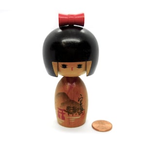 Japanese Kokeshi, Wood figure, black hair helmet, big red bow, Kimono with The Torii of Peace at Hakone Shrine, 4ins X 2ins, Vintage 1990s