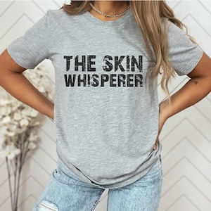 Dermatologist Shirt Dermatology Shirt Skin Care Shirt Dermatologist Gift Dermatology Skin Whisperer Dermatology Student Graduate Unisex Tee