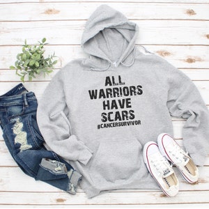 All warriors have scars, cancer survivor Unisex Heavy Blend™ Hooded Sweatshirt