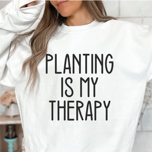 Planting is my therapy Heavy Blend Unisex Crewneck Sweatshirt