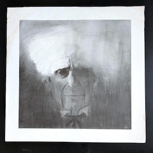 May include: A black and white charcoal drawing on paper depicting a portrait of an elderly person with a prominent, voluminous white hairstyle. The subject has deep-set eyes, a serious expression, and wears a dark collared shirt with a bow tie.